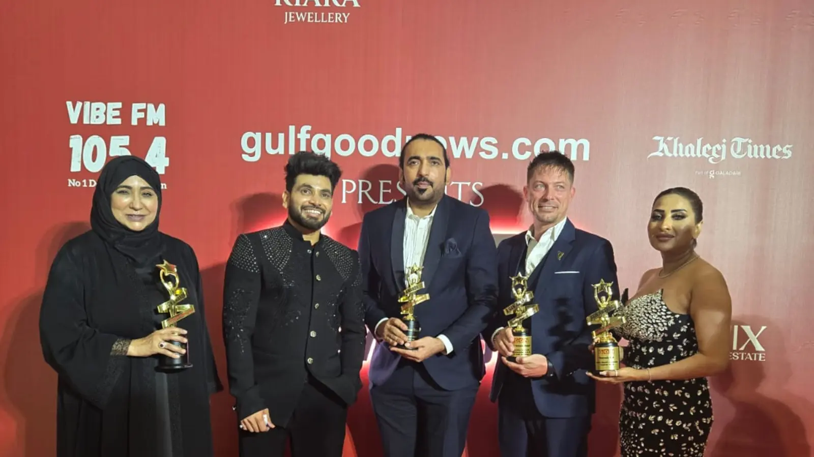 Award winners and media professionals at a major entertainment event